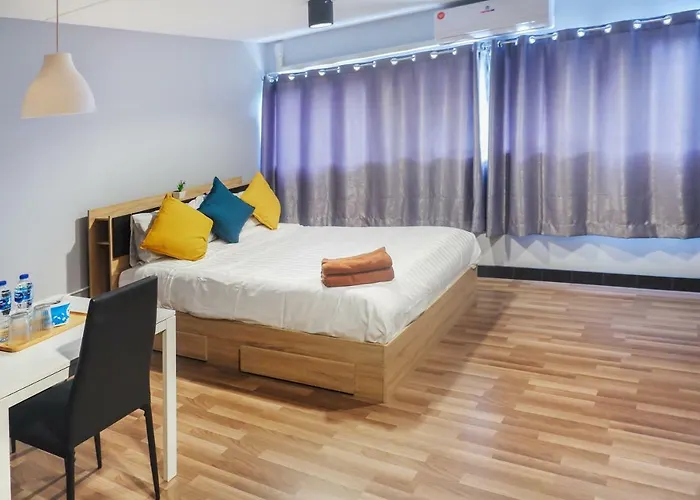 Séjour chez l'habitant Impact Popular Comdominium